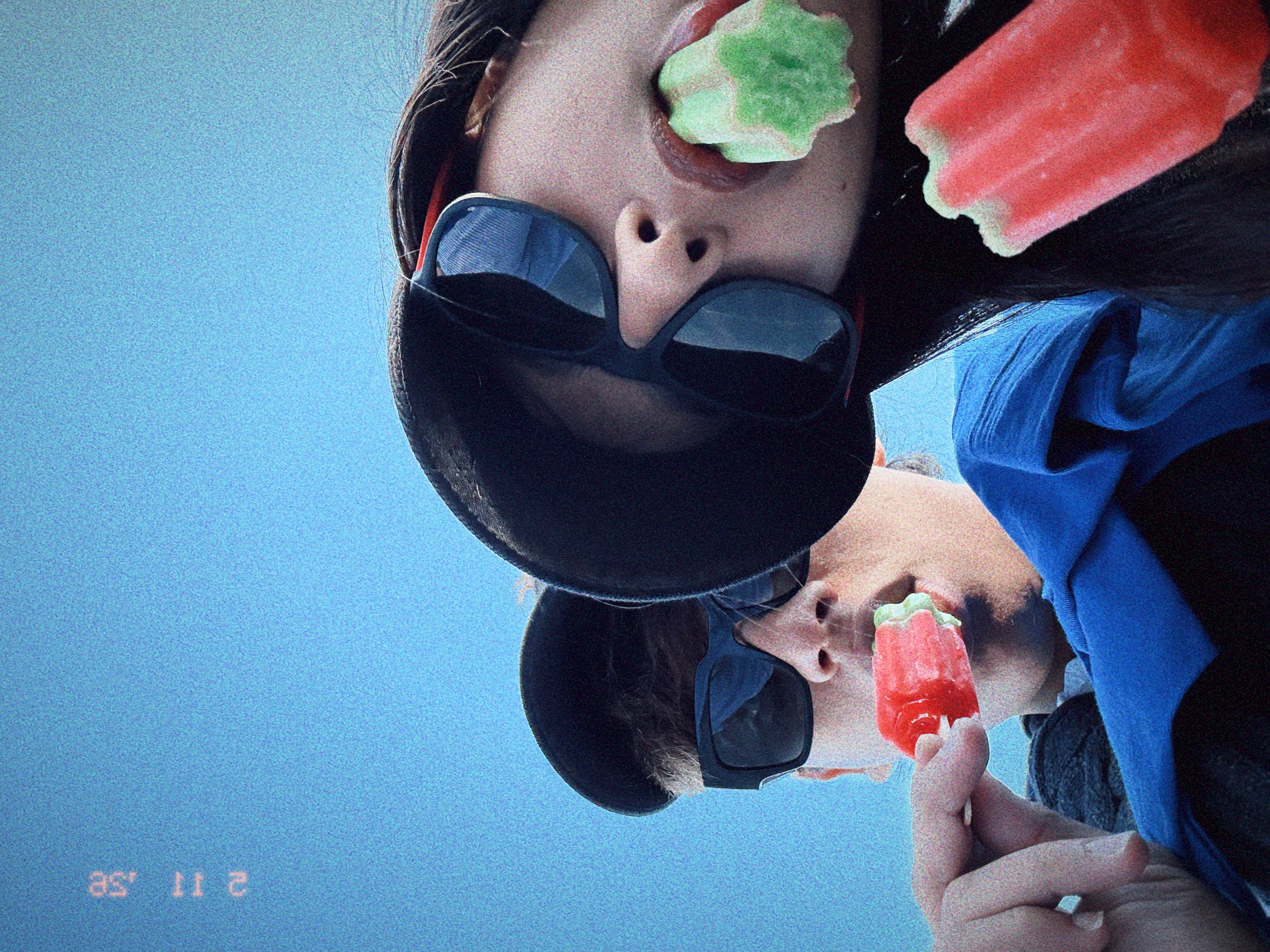 us with popsicles under a blue sky